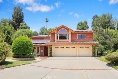 Nestled in West Covina's prestigious South Hills neighborhood on South Hills Country Club in California - for sale on GolfHomes.com, golf home, golf lot