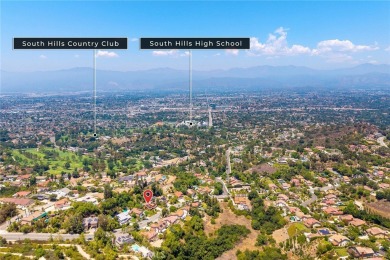 Nestled in West Covina's prestigious South Hills neighborhood on South Hills Country Club in California - for sale on GolfHomes.com, golf home, golf lot