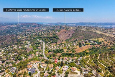 Nestled in West Covina's prestigious South Hills neighborhood on South Hills Country Club in California - for sale on GolfHomes.com, golf home, golf lot