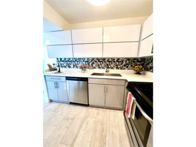 Step into this tastefully renovated 2-bedroom, 2-bath residence on Turnberry Isle Resort and Club in Florida - for sale on GolfHomes.com, golf home, golf lot