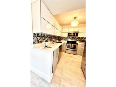 Step into this tastefully renovated 2-bedroom, 2-bath residence on Turnberry Isle Resort and Club in Florida - for sale on GolfHomes.com, golf home, golf lot