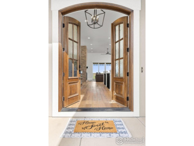 Step into this elegant home nestled in the prestigious Sanctuary on Highland Meadows Golf Course in Colorado - for sale on GolfHomes.com, golf home, golf lot