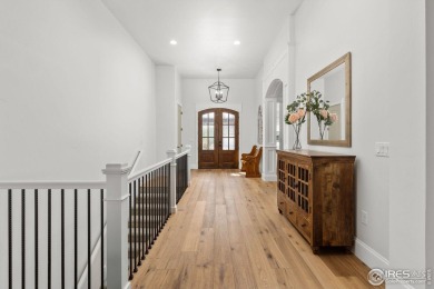 Step into this elegant home nestled in the prestigious Sanctuary on Highland Meadows Golf Course in Colorado - for sale on GolfHomes.com, golf home, golf lot