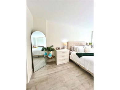 Step into this tastefully renovated 2-bedroom, 2-bath residence on Turnberry Isle Resort and Club in Florida - for sale on GolfHomes.com, golf home, golf lot
