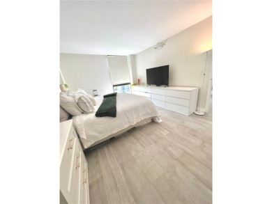 Step into this tastefully renovated 2-bedroom, 2-bath residence on Turnberry Isle Resort and Club in Florida - for sale on GolfHomes.com, golf home, golf lot