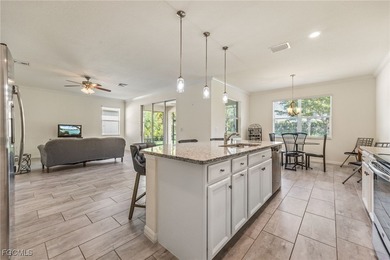 LIKE-NEW Roma Model home offering a bright, OPEN-CONCEPT DESIGN on Pelican Preserve Golf Club in Florida - for sale on GolfHomes.com, golf home, golf lot