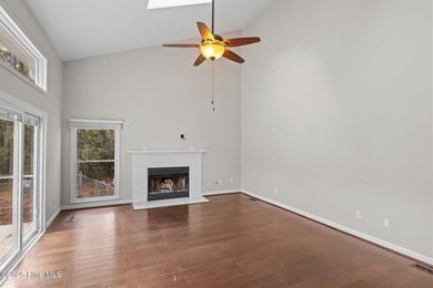 Nestled among mature trees in one of Morehead City's most on Brandywine Bay Golf Club in North Carolina - for sale on GolfHomes.com, golf home, golf lot