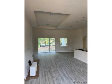 This meticulously crafted 2025 Genesis 2 model home boasts 3 on Southern Woods Golf Club in Florida - for sale on GolfHomes.com, golf home, golf lot