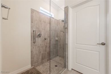 LIKE-NEW Roma Model home offering a bright, OPEN-CONCEPT DESIGN on Pelican Preserve Golf Club in Florida - for sale on GolfHomes.com, golf home, golf lot