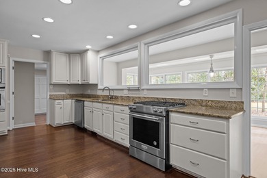 Nestled among mature trees in one of Morehead City's most on Brandywine Bay Golf Club in North Carolina - for sale on GolfHomes.com, golf home, golf lot