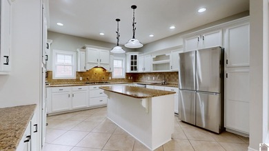 Gorgeous home in Lone Oak has a large fully fenced yard! Inside on Rolling Hills Country Club in Kentucky - for sale on GolfHomes.com, golf home, golf lot