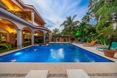 Villa Maravilla is a beautifully crafted golf-front residence on Club De Golf Puerto Aventuras in  - for sale on GolfHomes.com, golf home, golf lot