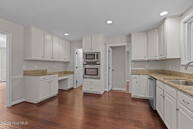 Nestled among mature trees in one of Morehead City's most on Brandywine Bay Golf Club in North Carolina - for sale on GolfHomes.com, golf home, golf lot