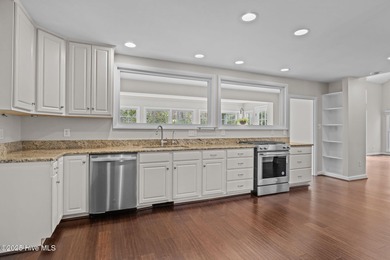 Nestled among mature trees in one of Morehead City's most on Brandywine Bay Golf Club in North Carolina - for sale on GolfHomes.com, golf home, golf lot