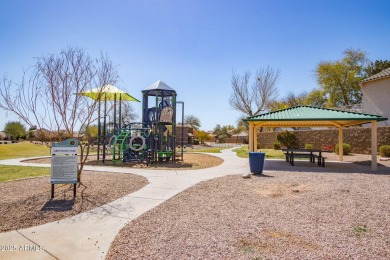 Beautiful single story home with relaxing, idyllic backyard on a on The Golf Club At Johnson Ranch in Arizona - for sale on GolfHomes.com, golf home, golf lot
