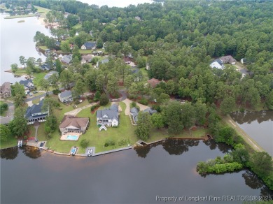 Welcome home to your lakefront retreat in the desirable on Carolina Lakes Country Club in North Carolina - for sale on GolfHomes.com, golf home, golf lot