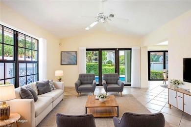 Tucked within the private enclave of Lugano in the prestigious on Club at Pelican Bay Golf Course in Florida - for sale on GolfHomes.com, golf home, golf lot