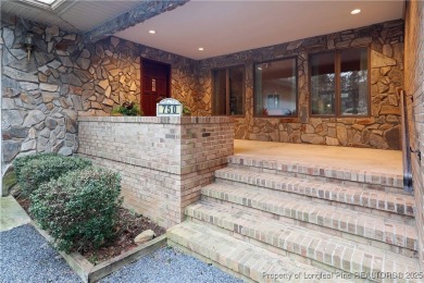 Golf-front living at its finest! This beautiful single-story on Woodlake Country Club in North Carolina - for sale on GolfHomes.com, golf home, golf lot
