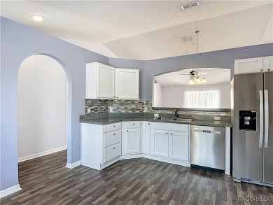 Discover the perfect blend of modern updates and move-in-ready on Citrus Springs Country Club in Florida - for sale on GolfHomes.com, golf home, golf lot