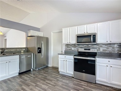 Discover the perfect blend of modern updates and move-in-ready on Citrus Springs Country Club in Florida - for sale on GolfHomes.com, golf home, golf lot