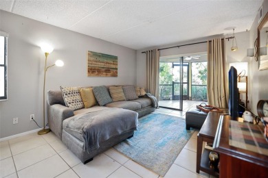 Looking for a 2 bedroom 2 bath 1st floor end unit condo? Well on East Lake Woodlands Country Club in Florida - for sale on GolfHomes.com, golf home, golf lot