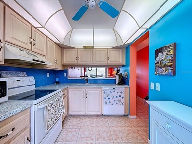 ***MOTIVATED SELLER*** Beautiful Condo Overlooking Isla Del Sol on Isla Del Sol Yacht and Country Club in Florida - for sale on GolfHomes.com, golf home, golf lot