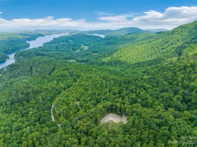 Perfectly located overlooking NCs largest private lake, Toxaway on Lake Toxaway Country Club in North Carolina - for sale on GolfHomes.com, golf home, golf lot