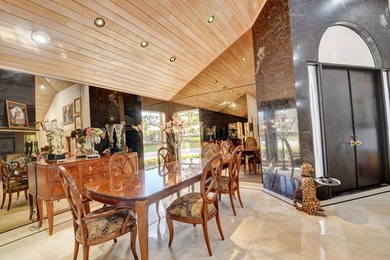 Step into this the foyer of this magnificent builders custom on Delray Dunes Golf and Country Club in Florida - for sale on GolfHomes.com, golf home, golf lot