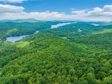 Perfectly located overlooking NCs largest private lake, Toxaway on Lake Toxaway Country Club in North Carolina - for sale on GolfHomes.com, golf home, golf lot