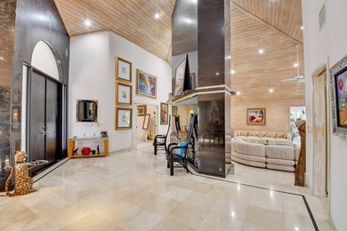 Step into this the foyer of this magnificent builders custom on Delray Dunes Golf and Country Club in Florida - for sale on GolfHomes.com, golf home, golf lot