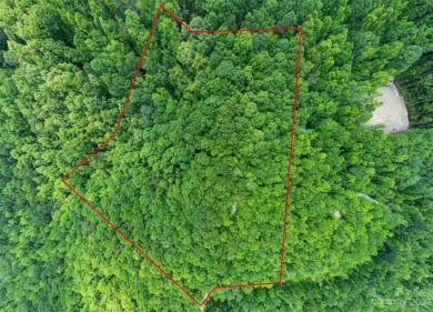 Perfectly located overlooking NCs largest private lake, Toxaway on Lake Toxaway Country Club in North Carolina - for sale on GolfHomes.com, golf home, golf lot