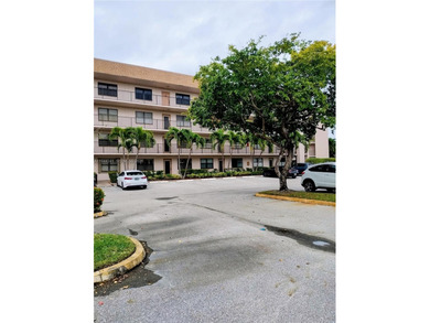 Waterfront/golf course view from your Sunrise Lakes Phase 4 on Sunrise Lakes Phase IV Golf Course in Florida - for sale on GolfHomes.com, golf home, golf lot