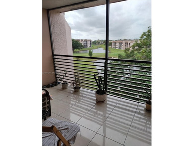 Waterfront/golf course view from your Sunrise Lakes Phase 4 on Sunrise Lakes Phase IV Golf Course in Florida - for sale on GolfHomes.com, golf home, golf lot