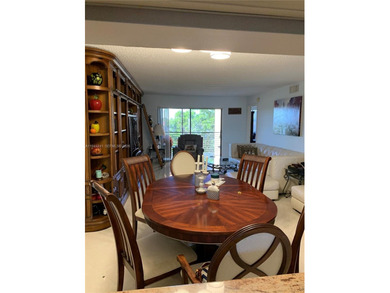 Waterfront/golf course view from your Sunrise Lakes Phase 4 on Sunrise Lakes Phase IV Golf Course in Florida - for sale on GolfHomes.com, golf home, golf lot