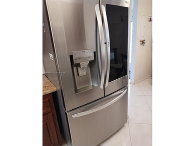 Waterfront/golf course view from your Sunrise Lakes Phase 4 on Sunrise Lakes Phase IV Golf Course in Florida - for sale on GolfHomes.com, golf home, golf lot