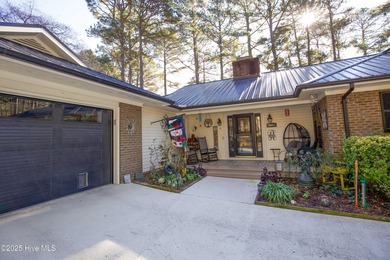 Perfectly positioned on a dog-leg right par five of the Seven on Seven Lakes Country Club in North Carolina - for sale on GolfHomes.com, golf home, golf lot