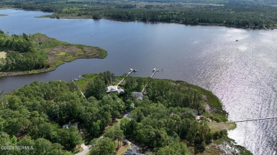 Buy a beautiful golf course lot and build your dream home in one on Harbour Point Golf Club in North Carolina - for sale on GolfHomes.com, golf home, golf lot