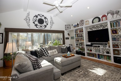 Perfectly positioned on a dog-leg right par five of the Seven on Seven Lakes Country Club in North Carolina - for sale on GolfHomes.com, golf home, golf lot