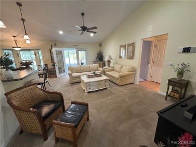 This beautiful custom home features three bedrooms and a on Citrus Springs Country Club in Florida - for sale on GolfHomes.com, golf home, golf lot