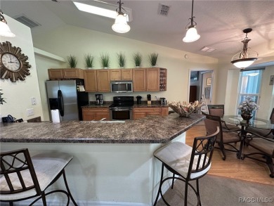 This beautiful custom home features three bedrooms and a on Citrus Springs Country Club in Florida - for sale on GolfHomes.com, golf home, golf lot