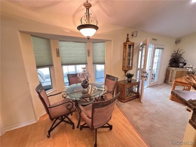 This beautiful custom home features three bedrooms and a on Citrus Springs Country Club in Florida - for sale on GolfHomes.com, golf home, golf lot