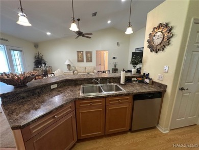 This beautiful custom home features three bedrooms and a on Citrus Springs Country Club in Florida - for sale on GolfHomes.com, golf home, golf lot
