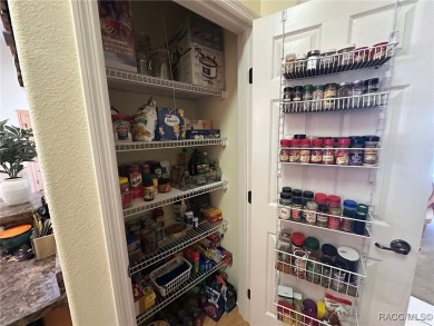 This beautiful custom home features three bedrooms and a on Citrus Springs Country Club in Florida - for sale on GolfHomes.com, golf home, golf lot