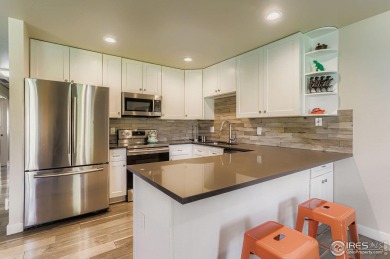 One level living! Completely renovated ranch style townhome in a on Lake Arbor Golf Course in Colorado - for sale on GolfHomes.com, golf home, golf lot