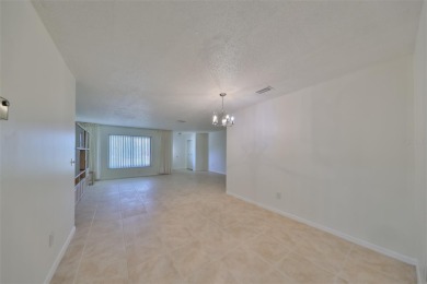 Under contract-accepting backup offers. One or more photo(s) has on Caloosa Greens Executive Golf Course in Florida - for sale on GolfHomes.com, golf home, golf lot