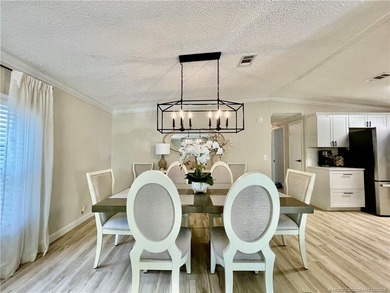 This gorgeous home was completely remodeled in 2023. THIS IS A on Indianwood Golf and Country Club in Florida - for sale on GolfHomes.com, golf home, golf lot
