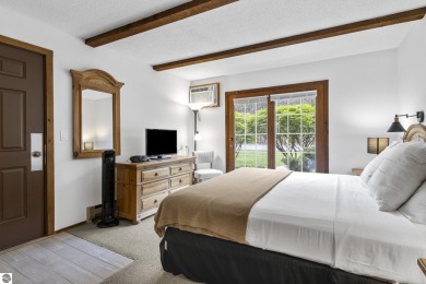 Amazing fully furnished condo with excellent rental history in on Crystal Mountain Golf Course in Michigan - for sale on GolfHomes.com, golf home, golf lot