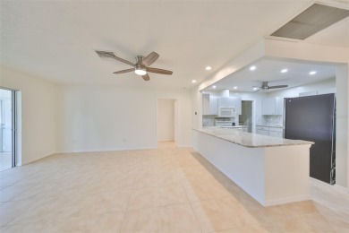 Under contract-accepting backup offers. One or more photo(s) has on Caloosa Greens Executive Golf Course in Florida - for sale on GolfHomes.com, golf home, golf lot