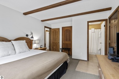 Amazing fully furnished condo with excellent rental history in on Crystal Mountain Golf Course in Michigan - for sale on GolfHomes.com, golf home, golf lot