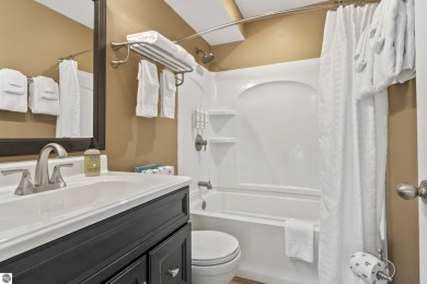 Amazing fully furnished condo with excellent rental history in on Crystal Mountain Golf Course in Michigan - for sale on GolfHomes.com, golf home, golf lot